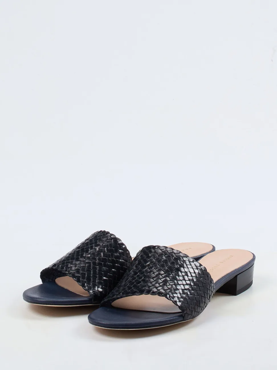 Andrea Puccini – Mules aus Flechtleder in Schwarz