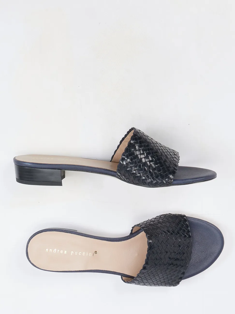 Andrea Puccini – Mules aus Flechtleder in Schwarz