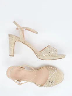 Andrea Puccini – Sandaletten aus Metallicmaterial in Gold