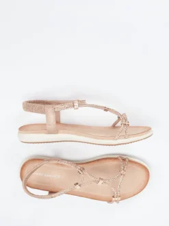 Andrea Puccini – Zehensteg-Sandalen aus Metallicleder rosa