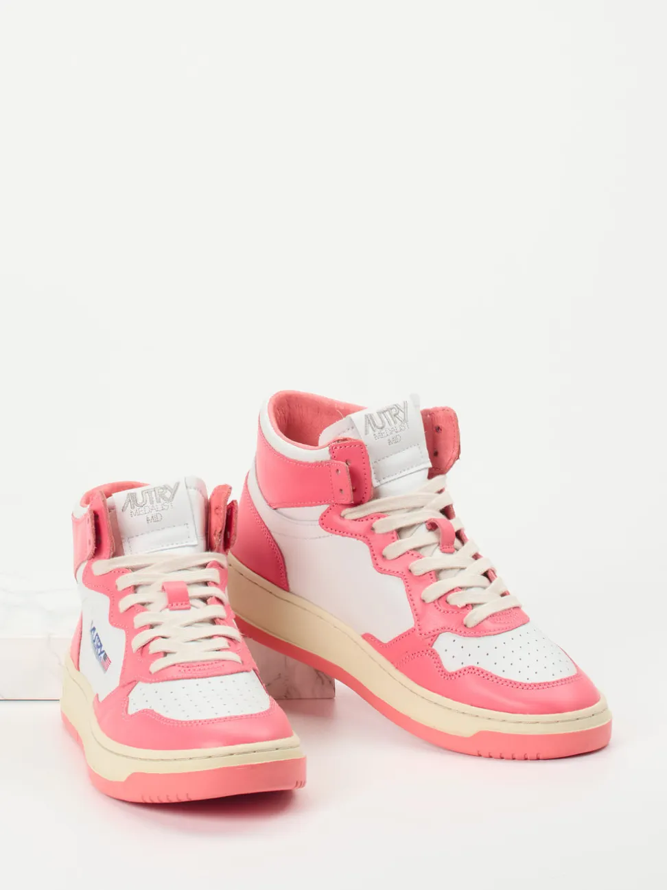 Autry – High-Top Sneaker aus Leder in Pink-Weiß