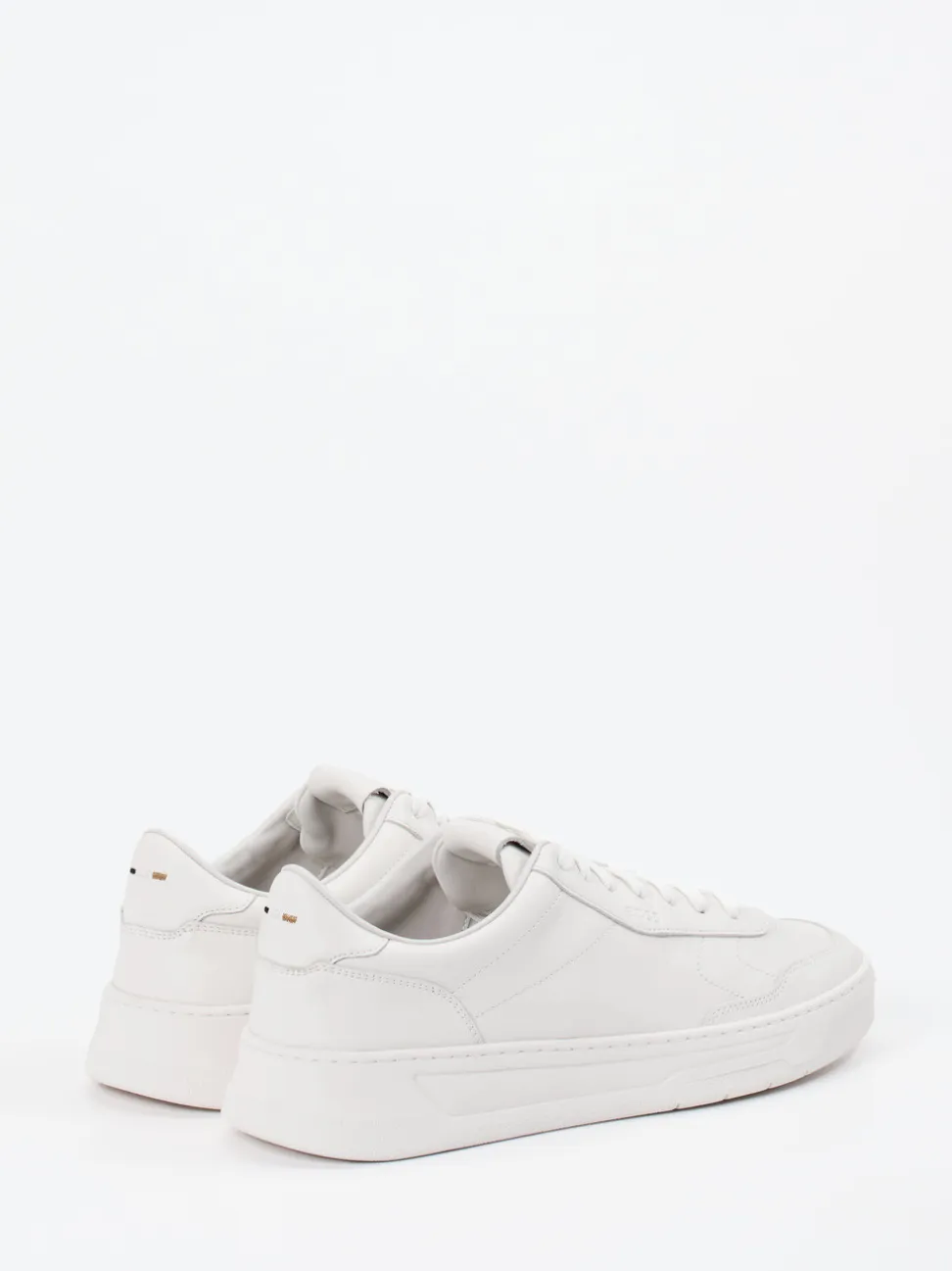 Boss – Sneaker aus Kalbleder in Offwhite