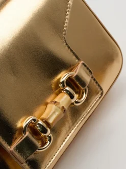 Konstantin Starke – Schultertasche aus Metallicleder Gold