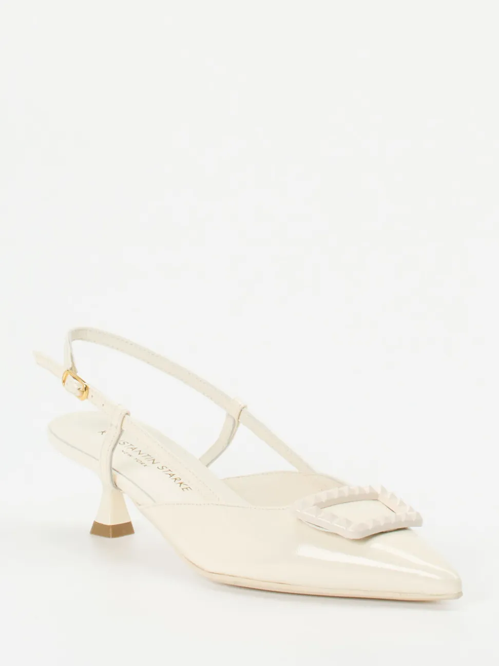Konstantin Starke – Slingback-Pumps aus Lackleder cremeweiß