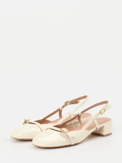 Konstantin Starke – Slingback-Pumps aus Lackleder cremeweiß