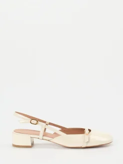 Konstantin Starke – Slingback-Pumps aus Lackleder cremeweiß