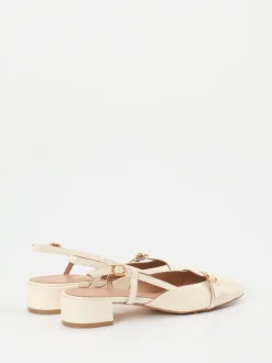Konstantin Starke – Slingback-Pumps aus Lackleder cremeweiß