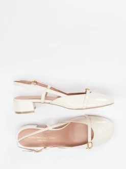 Konstantin Starke – Slingback-Pumps aus Lackleder cremeweiß