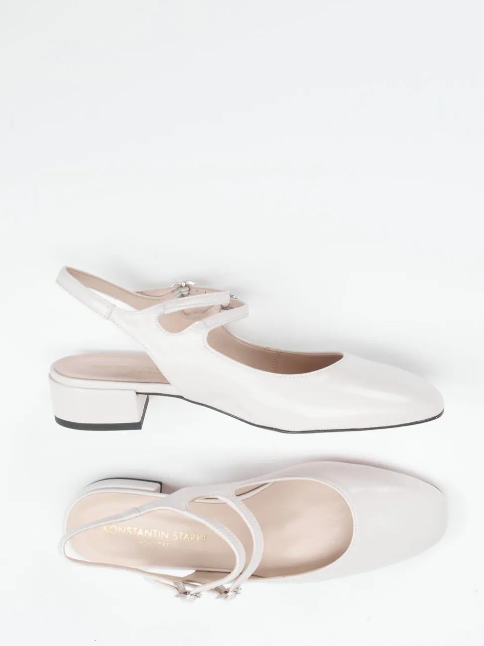 Konstantin Starke – Slingpumps aus Lackleder cremeweiß