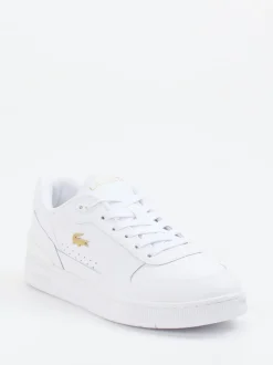 Lacoste – Sneaker aus Glattleder weiß mit Goldakzenten