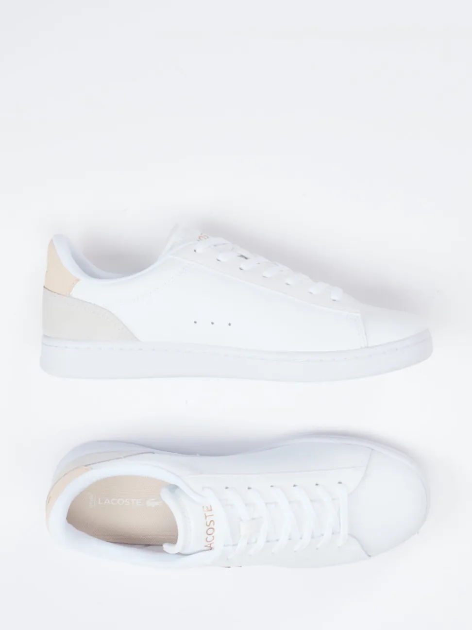 Lacoste – Sneaker aus Leder in Weiß mit Roségold