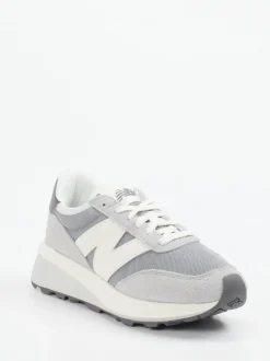 New Balance – Retro-Sneaker aus Textil in Grau