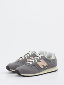 New Balance – Sneaker aus Textil und Veloursleder grau