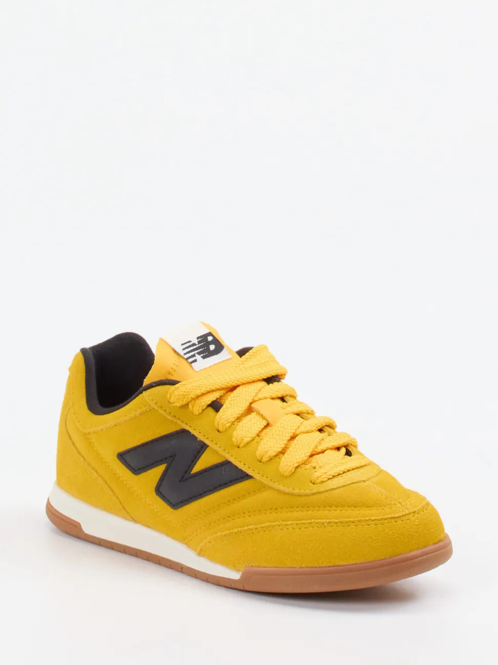 New Balance – Sneaker aus Veloursleder Senfgelb