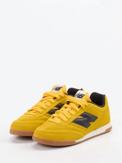 New Balance – Sneaker aus Veloursleder Senfgelb