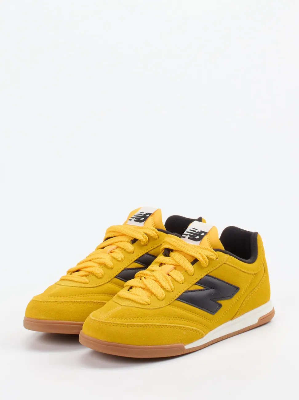 New Balance – Sneaker aus Veloursleder Senfgelb