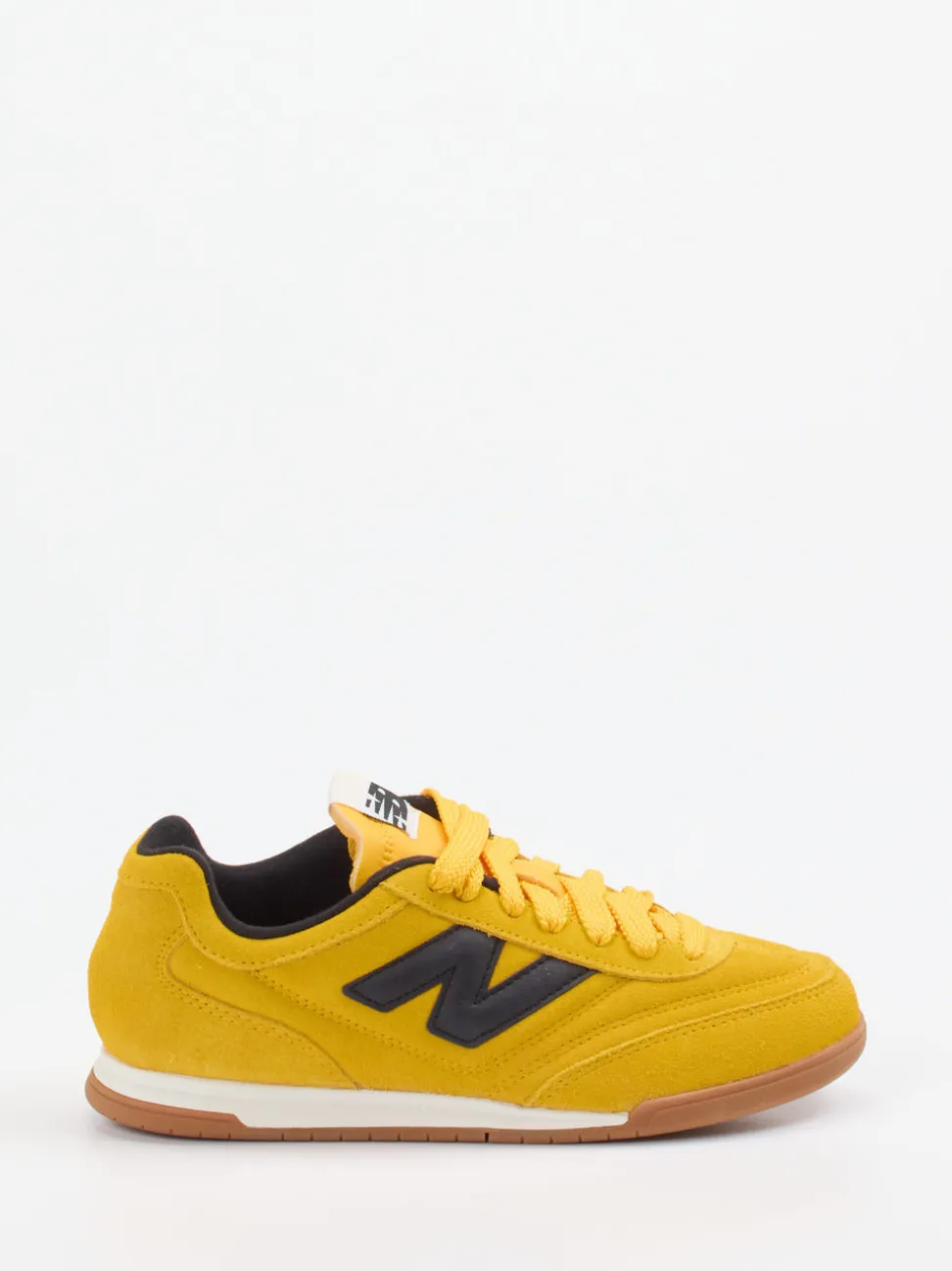 New Balance – Sneaker aus Veloursleder Senfgelb