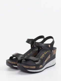 Panama Jack – Keilsandalette aus Lammleder schwarz