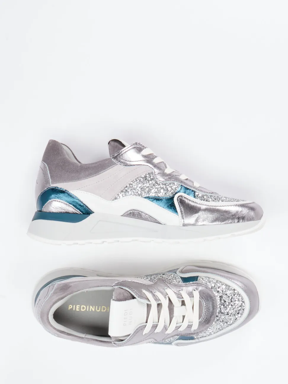 Piedi Nudi – Chunky Sneaker aus Metallicleder silber