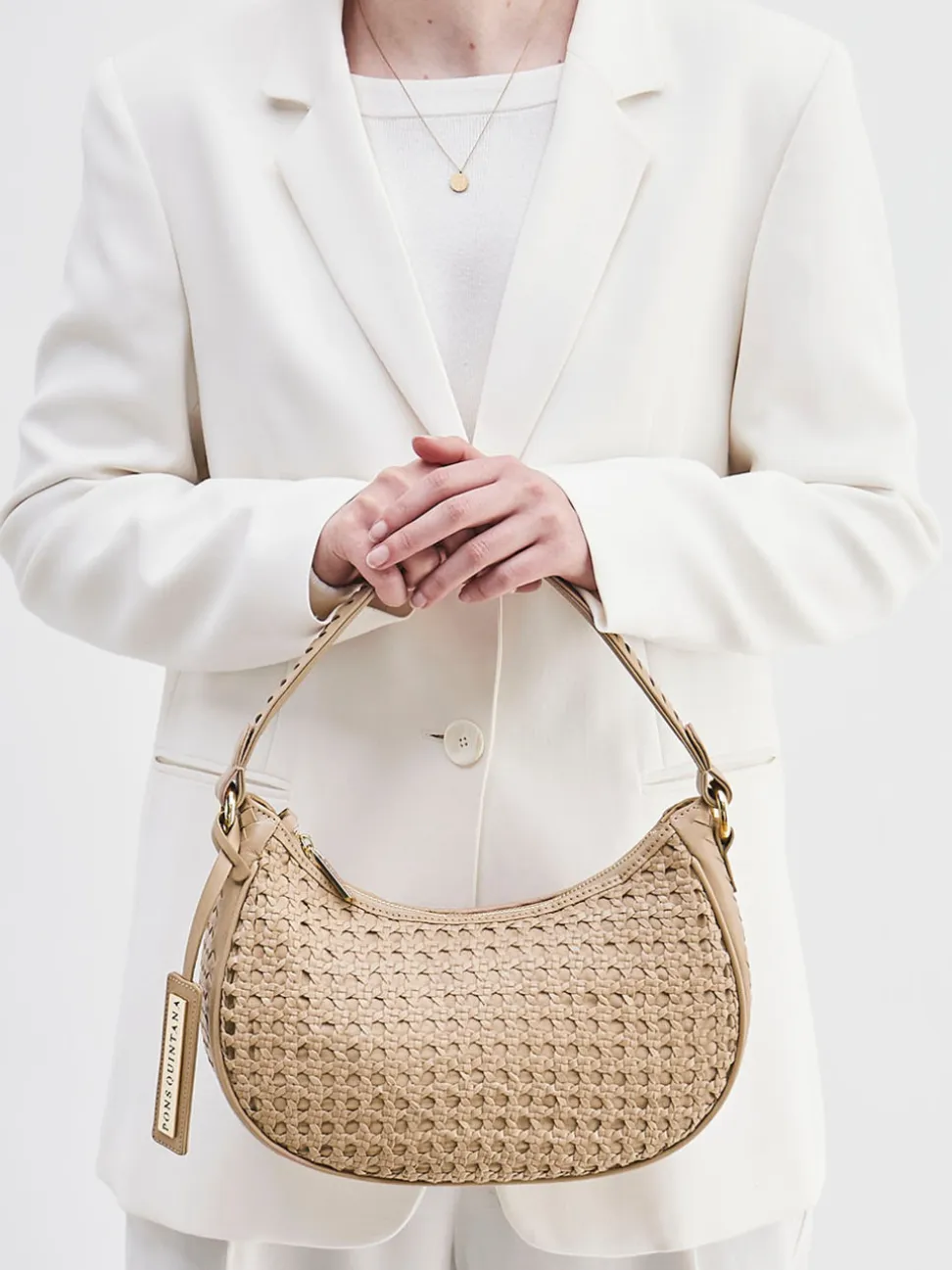Pons Quintana – Schultertasche aus Textil mit Flechtstruktur