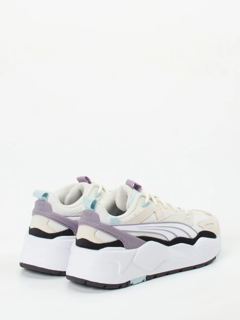 Puma – Chunky Sneaker aus Textil in Cremeweiß