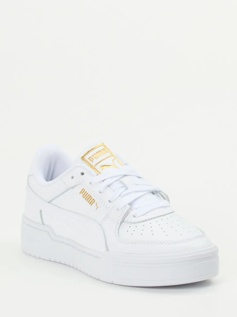 Puma – Sneaker aus Glattleder Weiß mit Goldakzenten