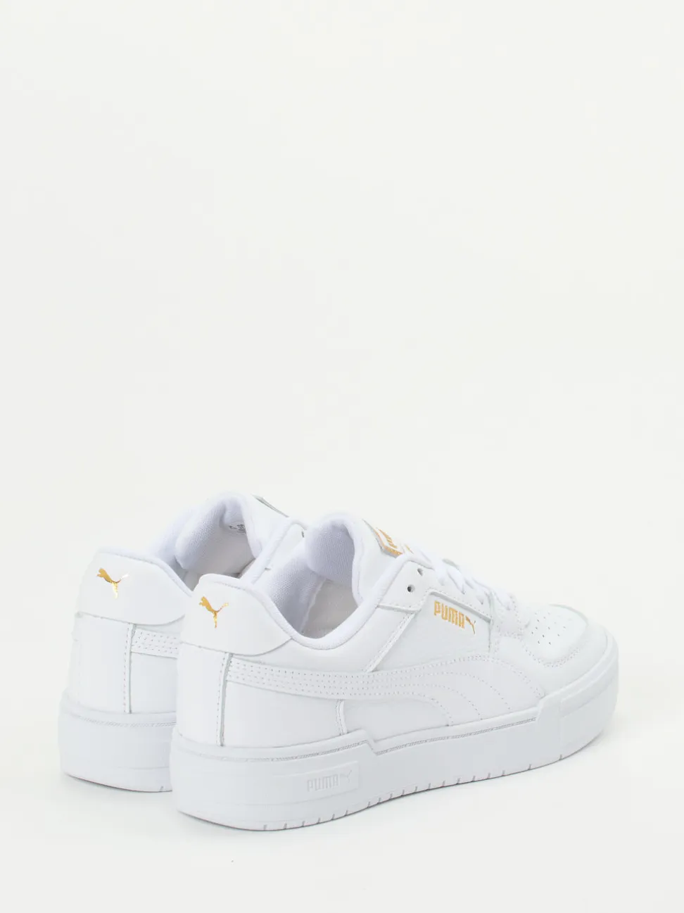 Puma – Sneaker aus Glattleder Weiß mit Goldakzenten