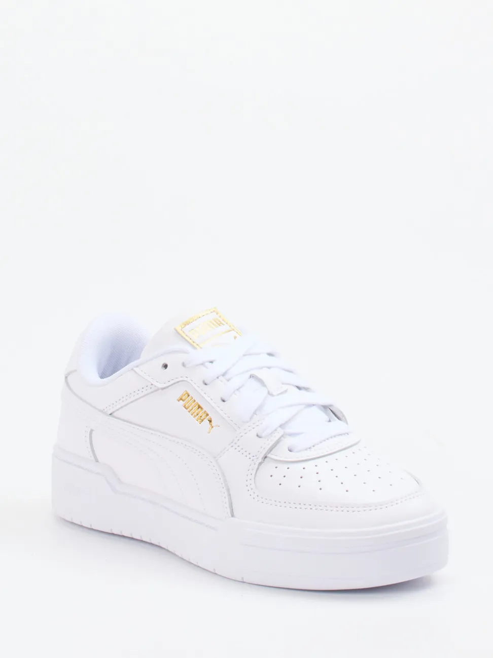 Puma – Sneaker aus Glattleder weiß mit Golddetails