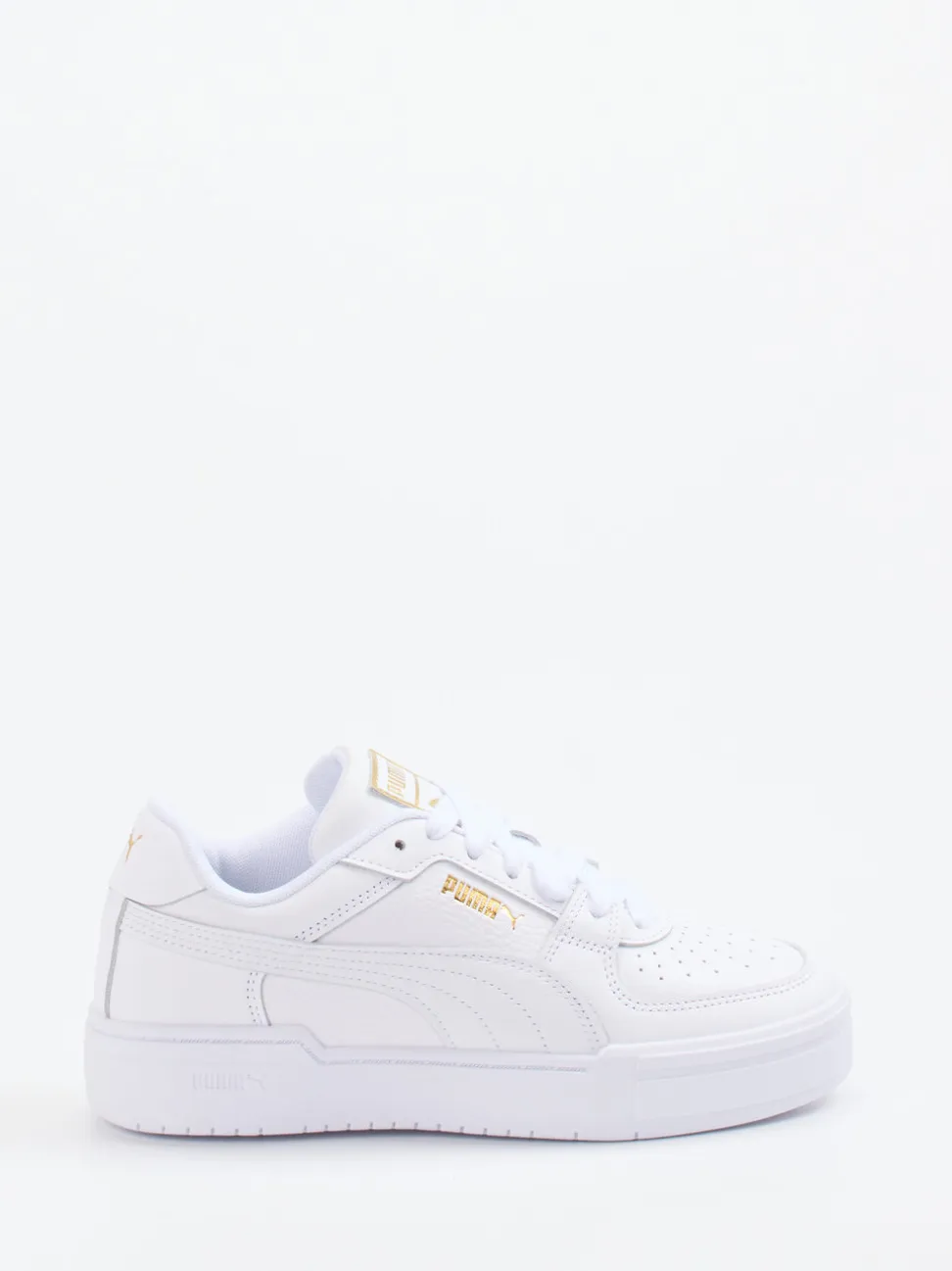 Puma – Sneaker aus Glattleder weiß mit Golddetails
