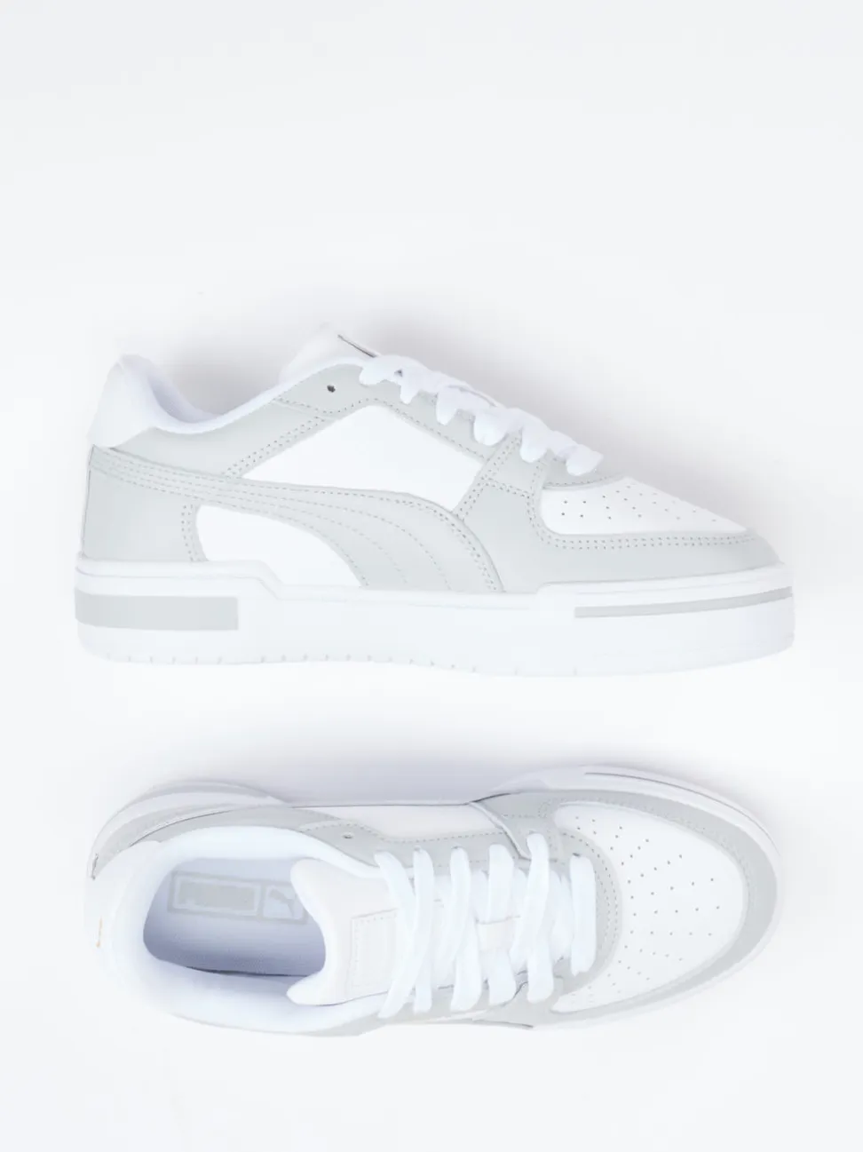 Puma – Sneaker aus Leder in Weiß mit Retro-Flair