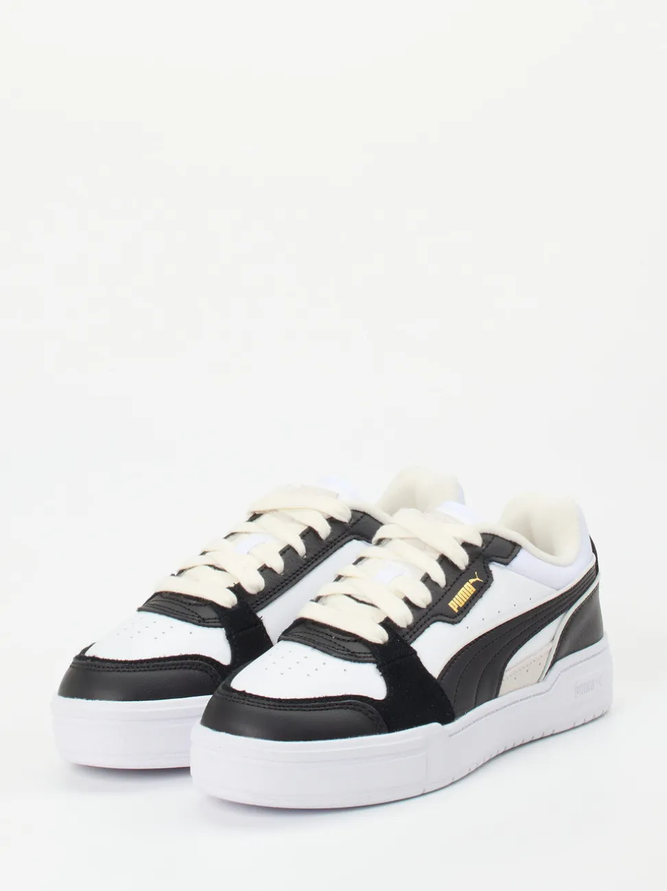 Puma – Sneaker aus Leder in Weiß mit Gold-Details