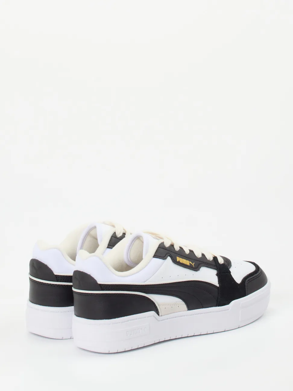 Puma – Sneaker aus Leder in Weiß mit Gold-Details
