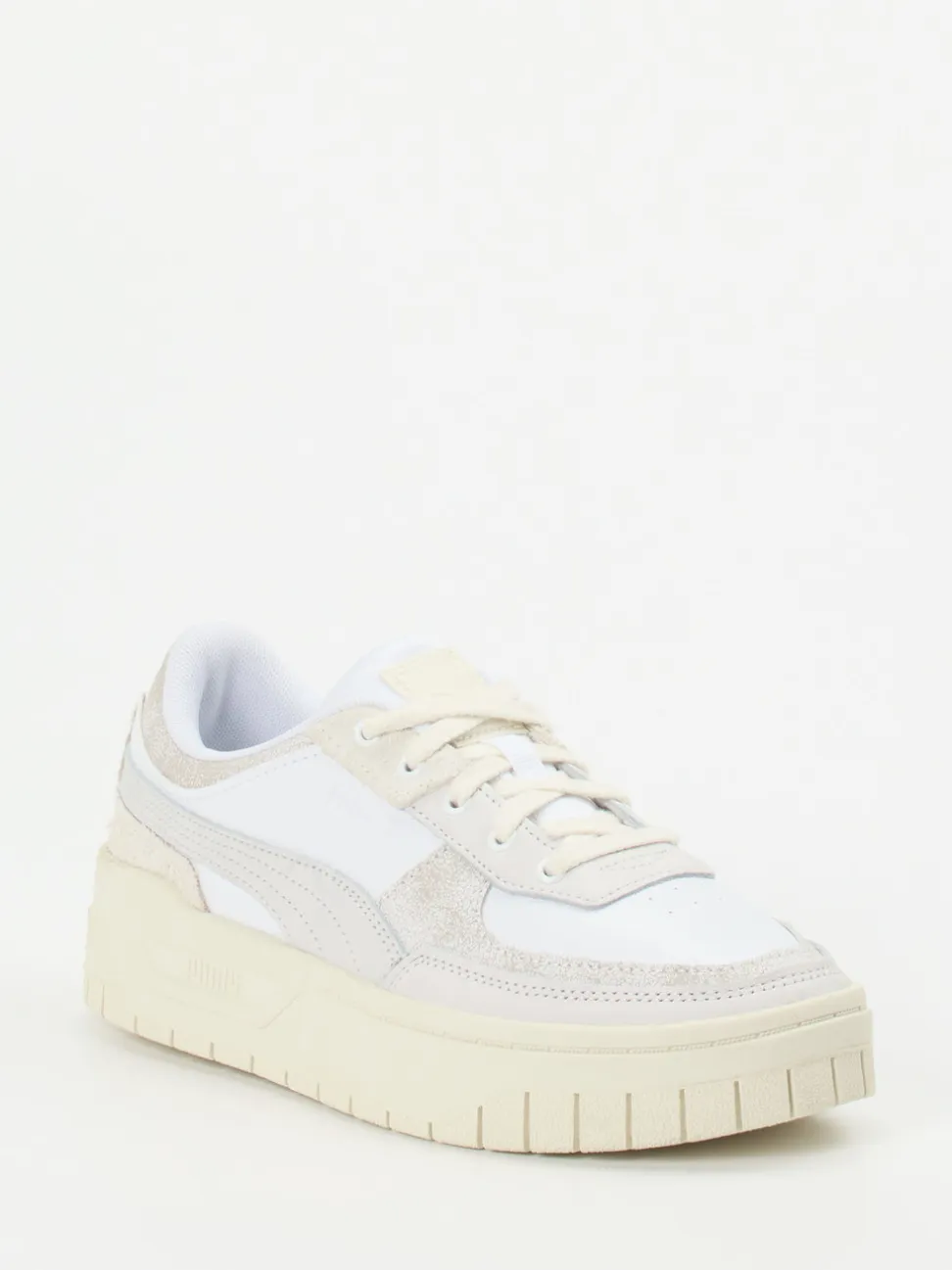 Puma – Sneaker aus Leder in Beige-Weiß