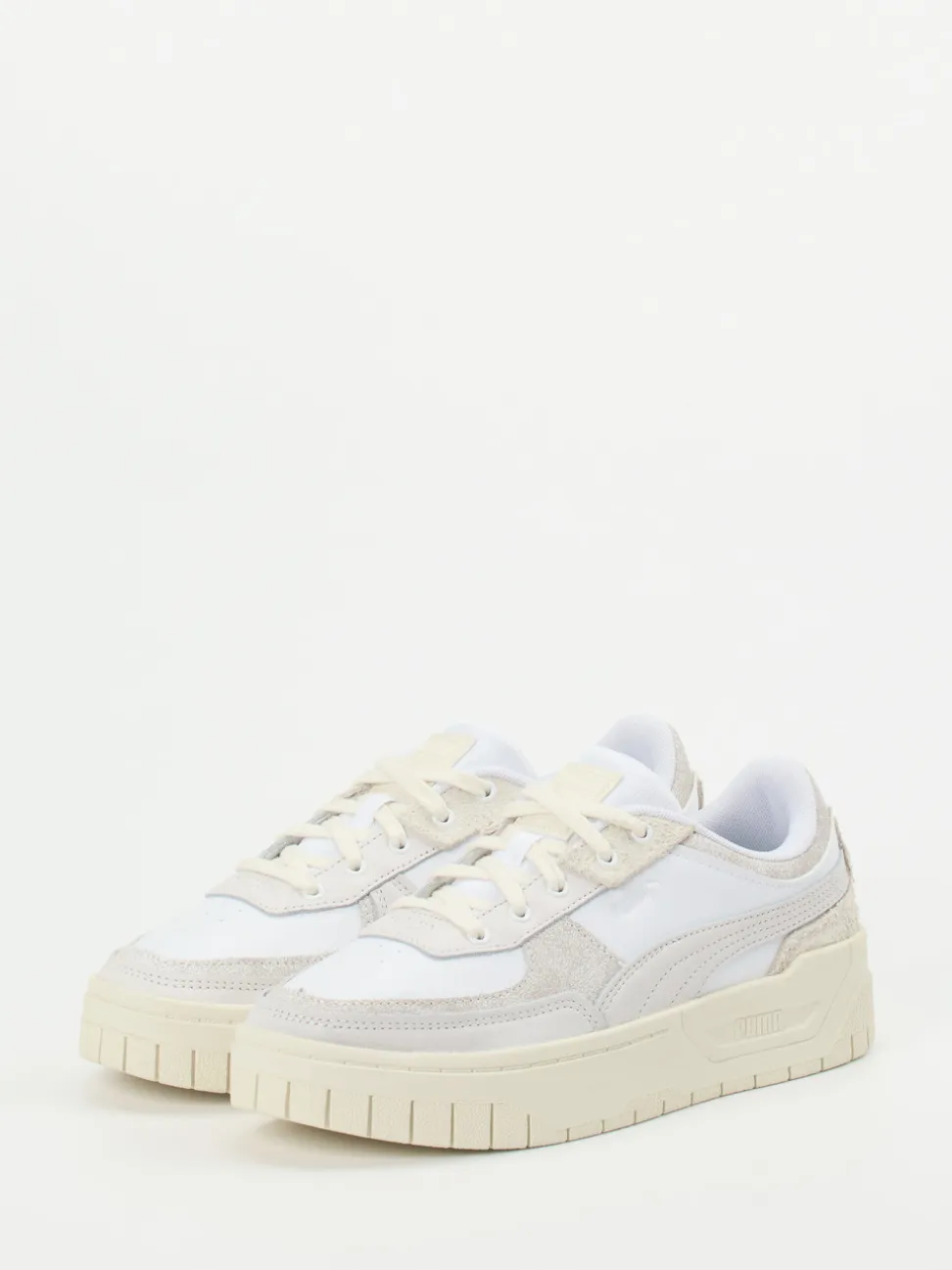 Puma – Sneaker aus Leder in Beige-Weiß