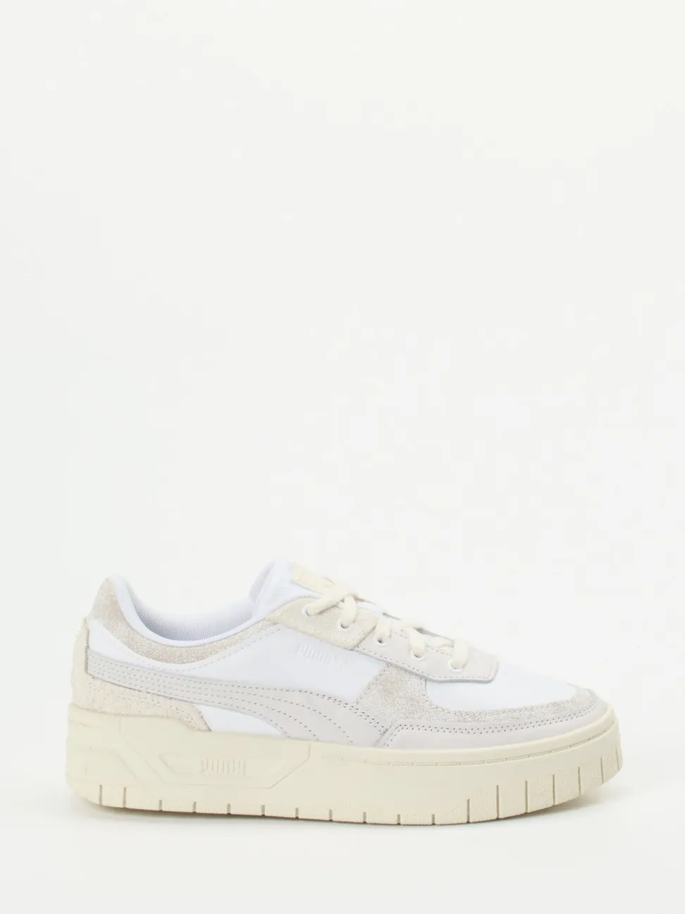 Puma – Sneaker aus Leder in Beige-Weiß