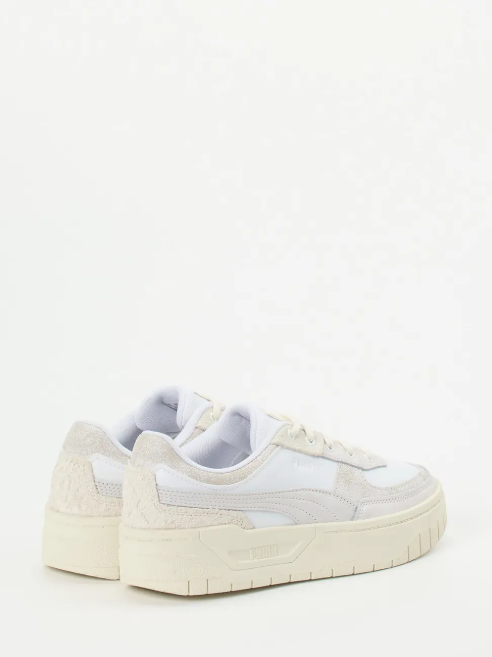 Puma – Sneaker aus Leder in Beige-Weiß