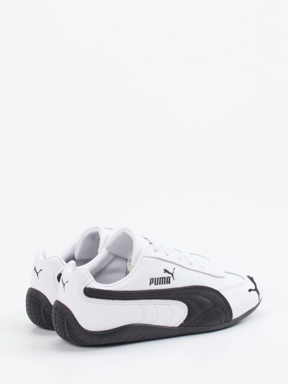 Puma – Sneaker aus Leder in Weiß mit Retro-Look