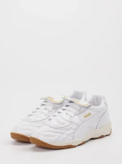Puma – Sneaker aus Leder in Weiß mit Gold-Detail