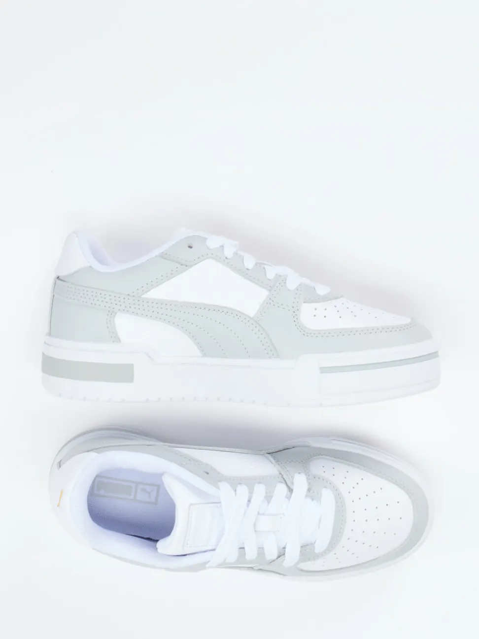 Puma – Sneaker aus Leder in Weiß mit Retro-Charme
