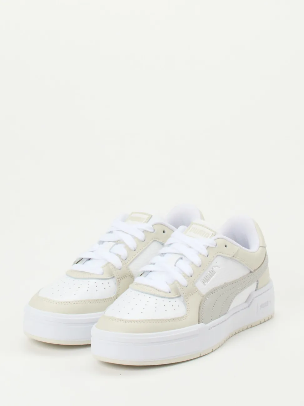 Puma – Sneaker aus Leder-Mesh-Mix in Offwhite