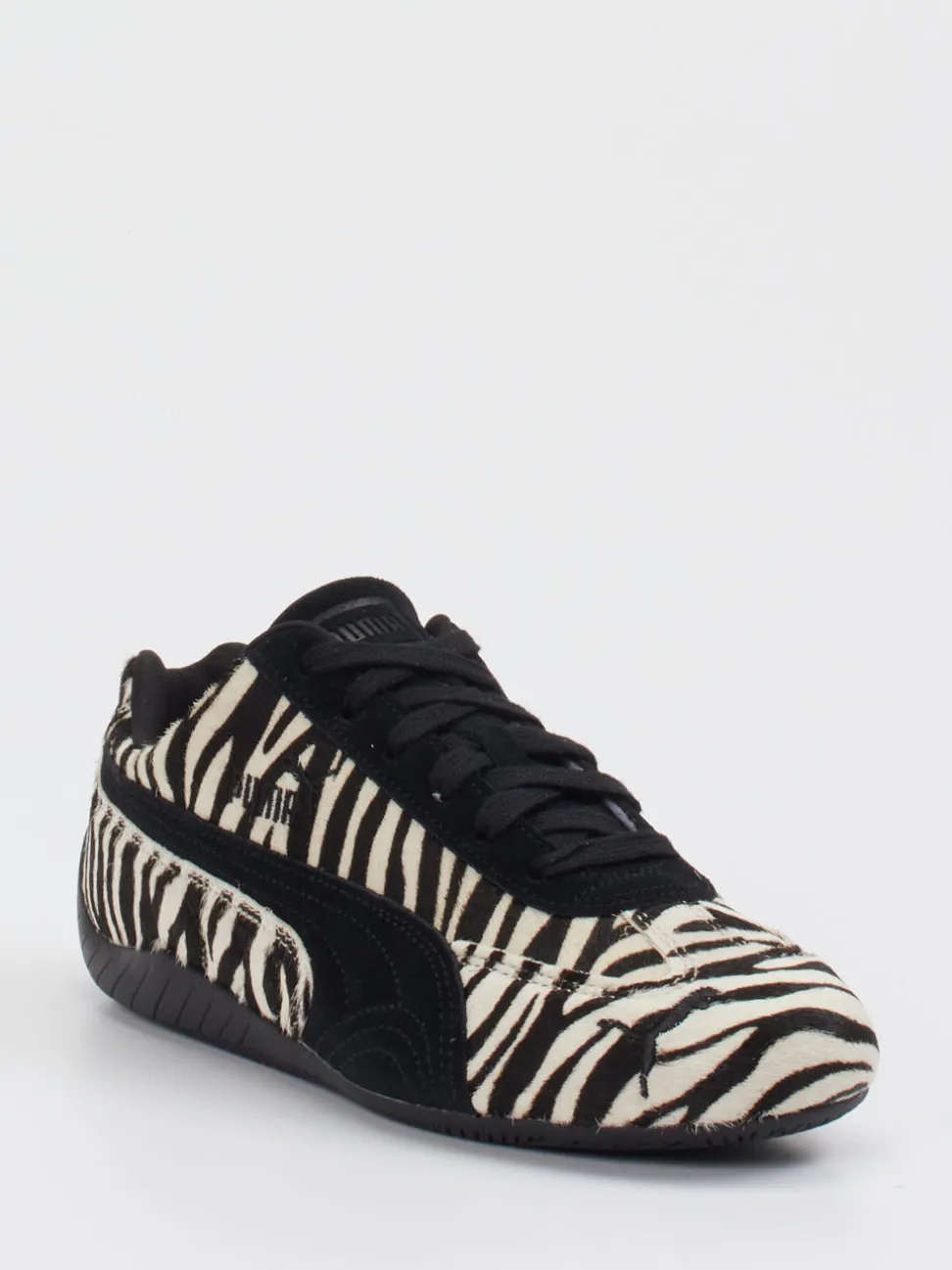 Puma – Sneaker aus Veloursleder und Fellstruktur schwarz