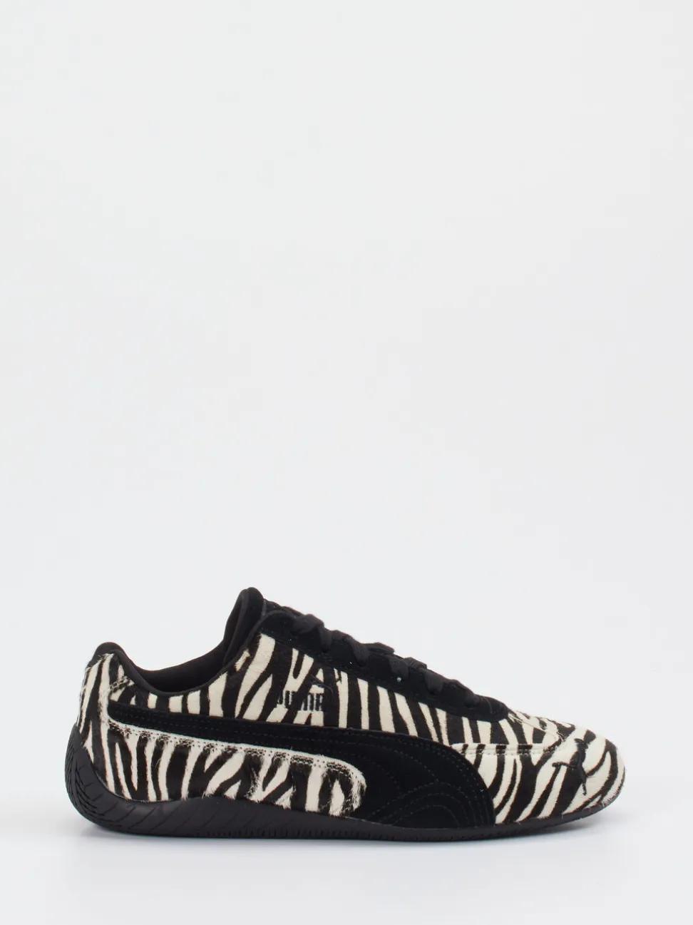Puma – Sneaker aus Veloursleder und Fellstruktur schwarz