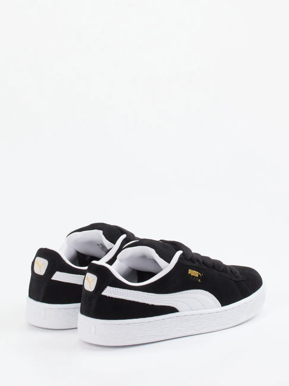 Puma – Sneaker aus Veloursleder Schwarz Retro-Look
