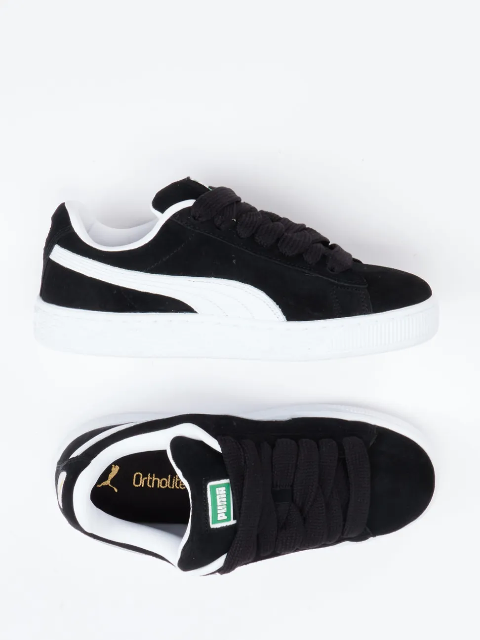 Puma – Sneaker aus Veloursleder Schwarz Retro-Look