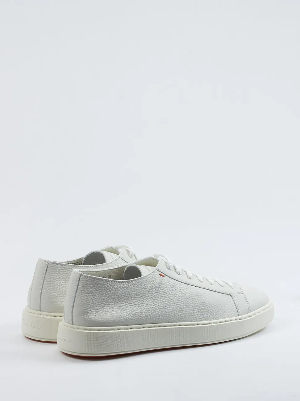 Santoni – Sneaker aus Kalbleder in Offwhite