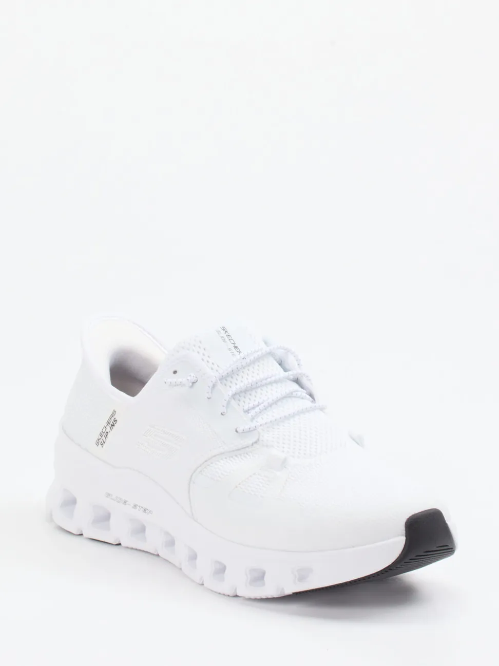 Skechers – Slip-On Sneaker aus Mesh in Weiß