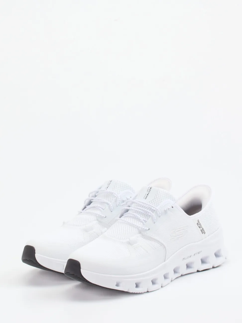 Skechers – Slip-On Sneaker aus Mesh in Weiß