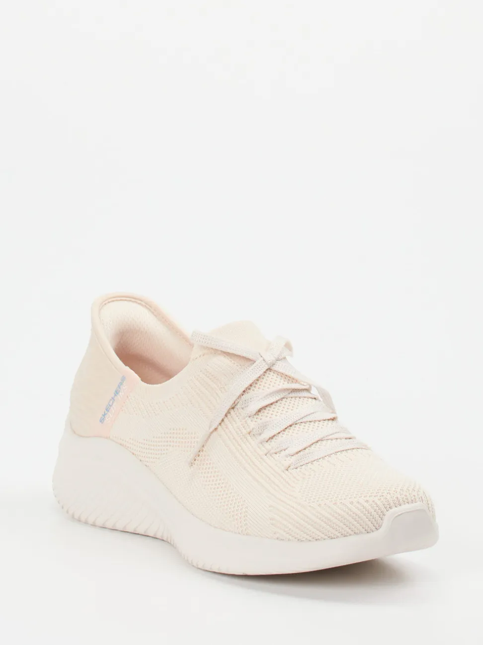 Skechers – Slip-On Sneaker aus Textil in Cremeweiß