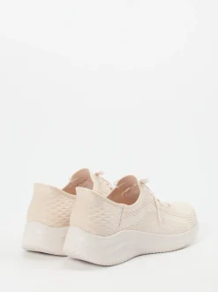 Skechers – Slip-On Sneaker aus Textil in Cremeweiß