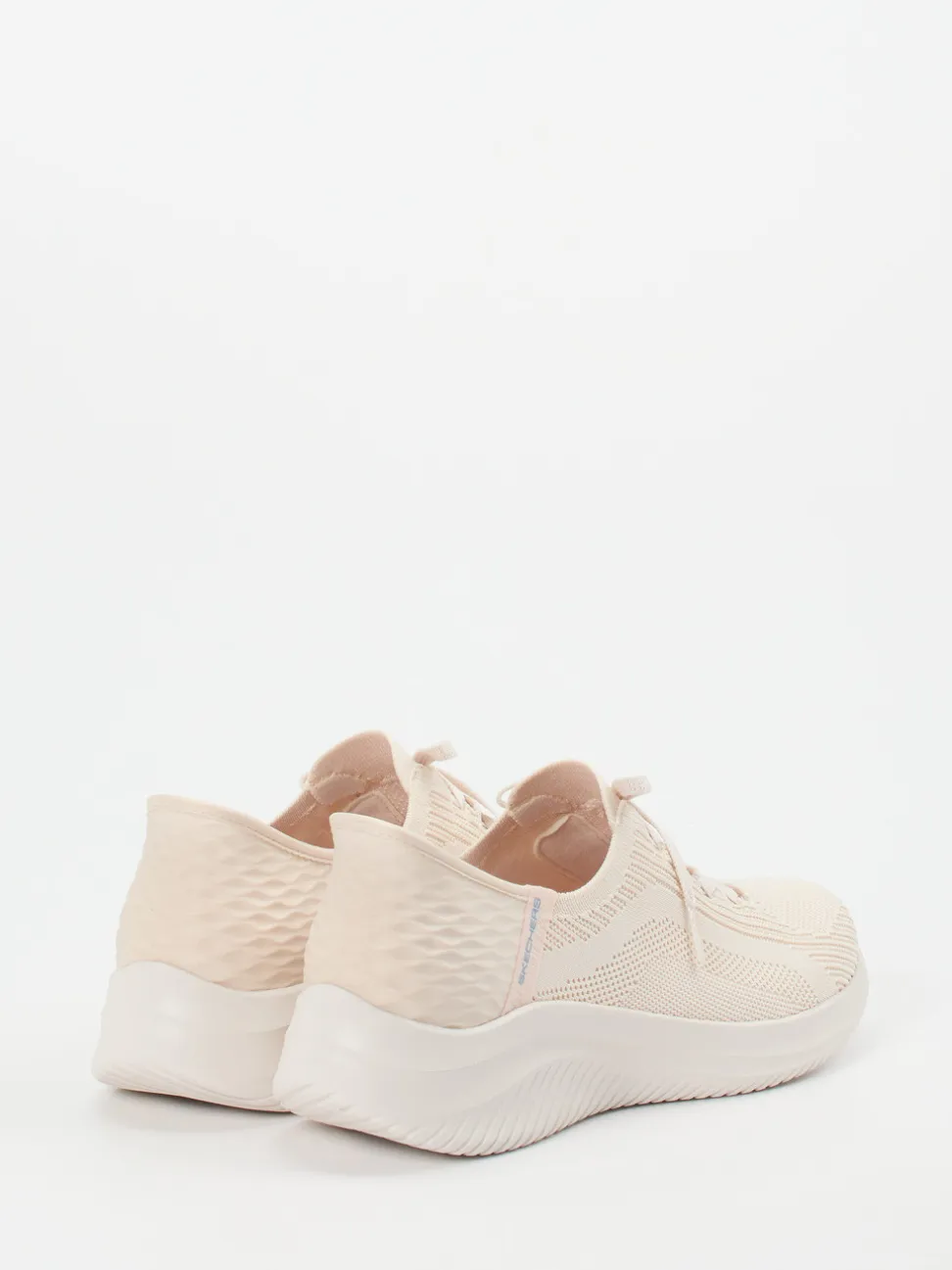 Skechers – Slip-On Sneaker aus Textil in Cremeweiß